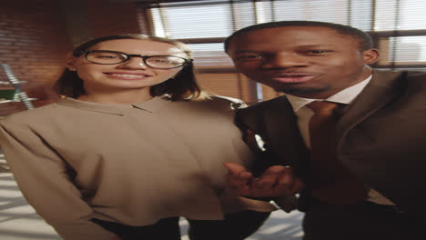 Multiethnic-Coworkers-Talking-on-Video-Call-in-Office